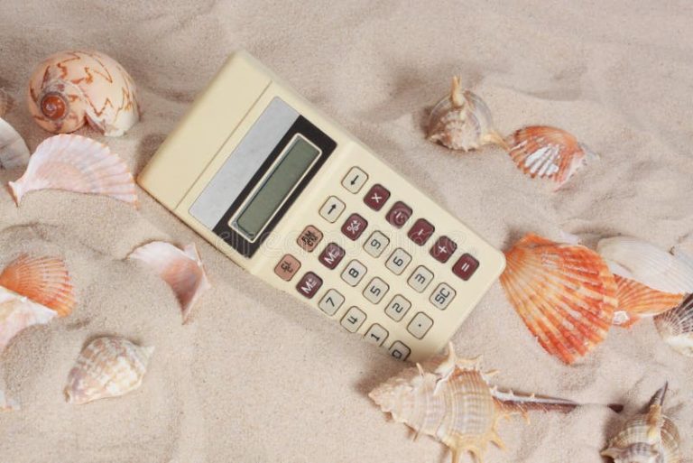 calculadora y vacaciones en la playa
